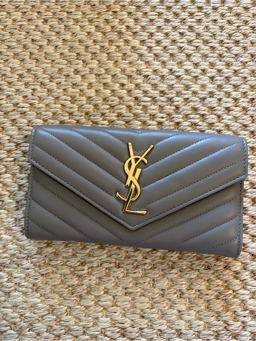 CASSANDRE MATELASSÉ LARGE FLAP WALLET IN LAMBSKIN